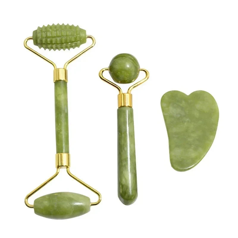 Green natural-stone face roller and gua sha set with gold frames on a white background
